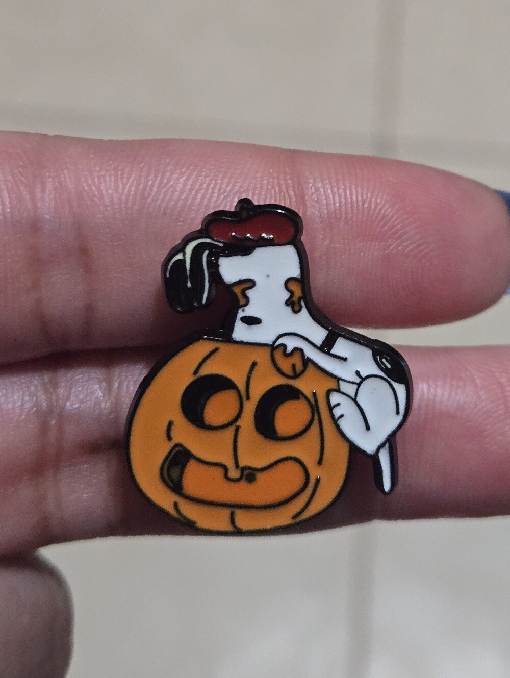 Peanuts: Snoopy on Jack-O'-Lantern Enamel Pin